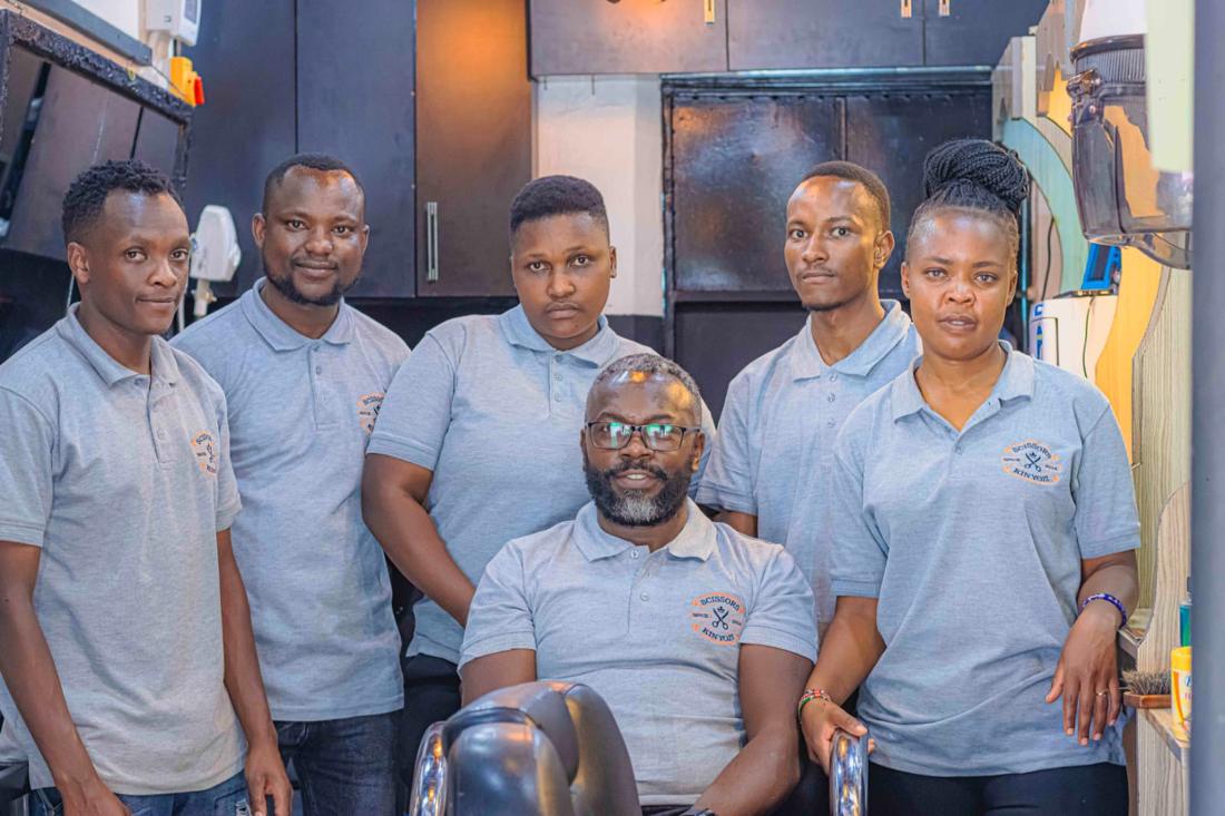The Scissors Kinyozi team inside the shop